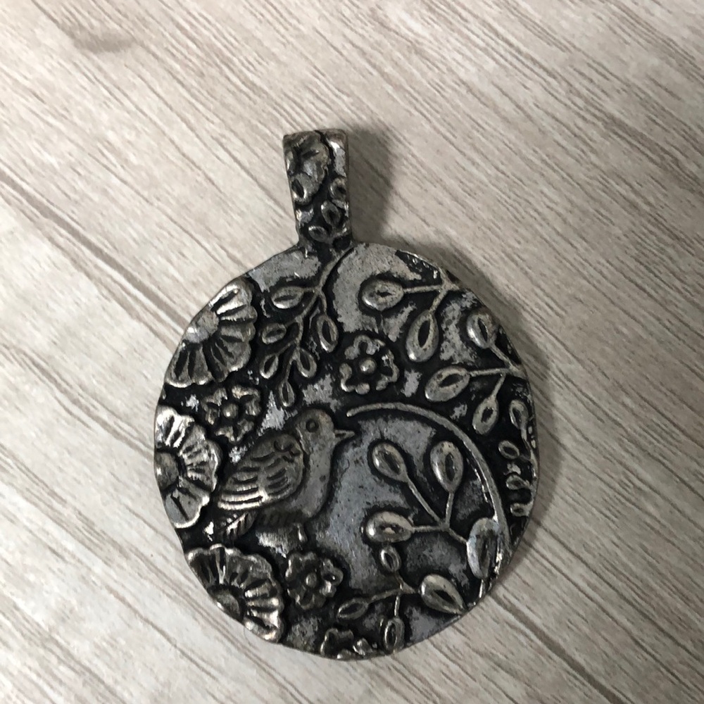 Silver pendant (chain not included)